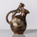 Bode Willumsen for Royal Copenhagen, Denmark, footed stoneware jug with lion handle K2279