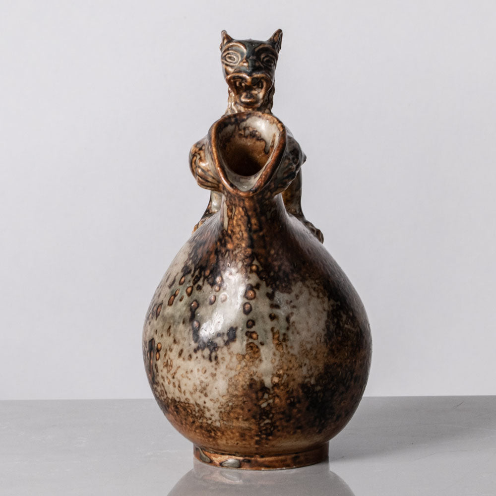 Bode Willumsen for Royal Copenhagen, Denmark, footed stoneware jug with lion handle K2279