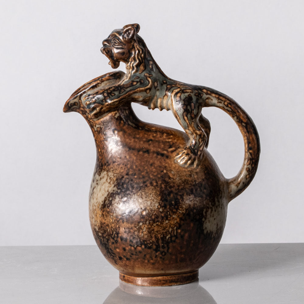 Bode Willumsen for Royal Copenhagen, Denmark, footed stoneware jug with lion handle K2279