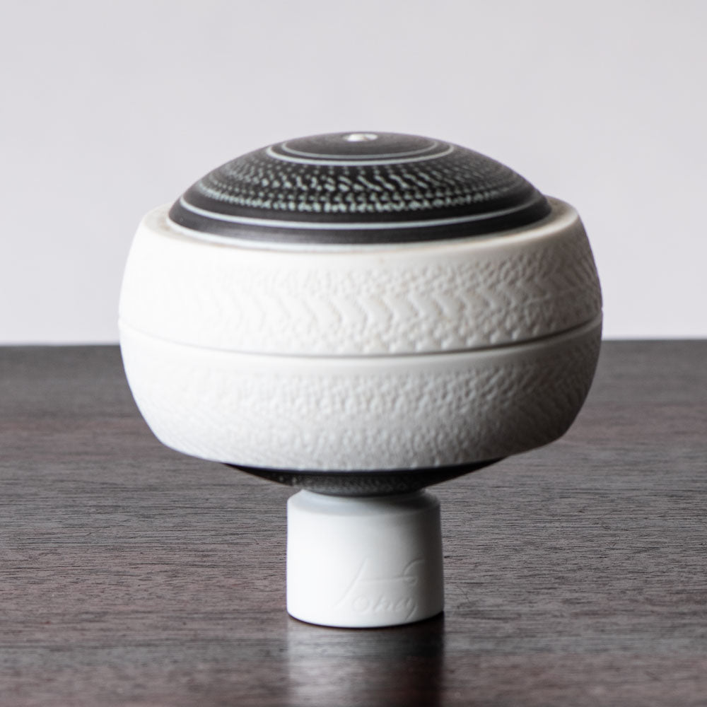 Horst Göbbels, own studio, Germany, porcelain lidded jar with black and white glaze J1273
