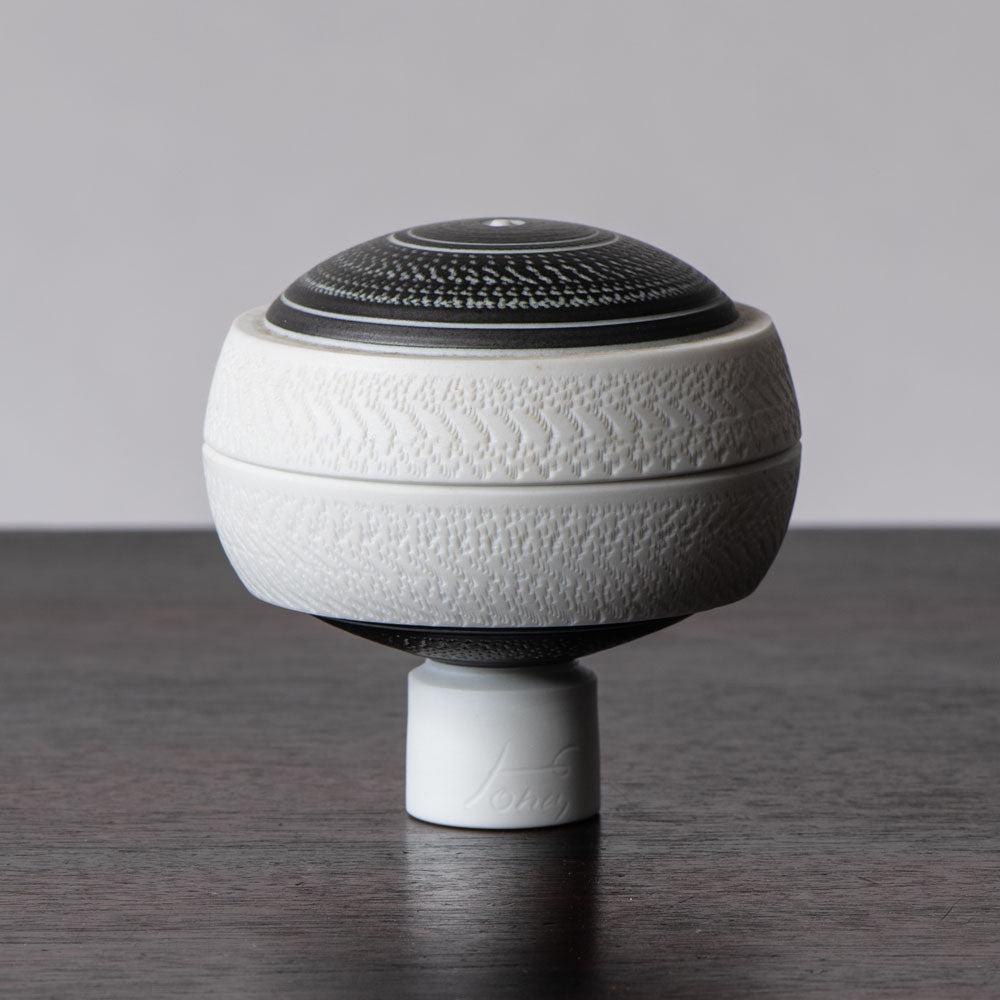 Horst Göbbels, own studio, Germany, porcelain lidded jar with black and white glaze J1273