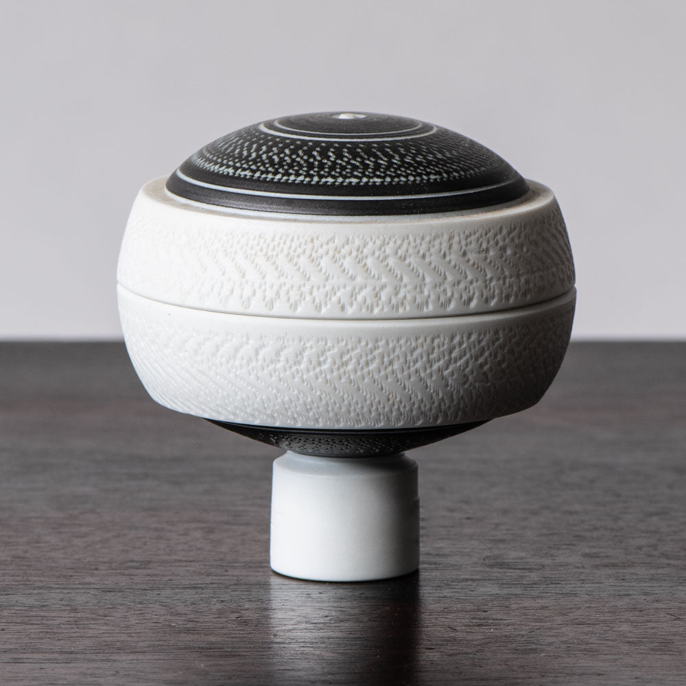 Horst Göbbels, own studio, Germany, porcelain lidded jar with black and white glaze J1273