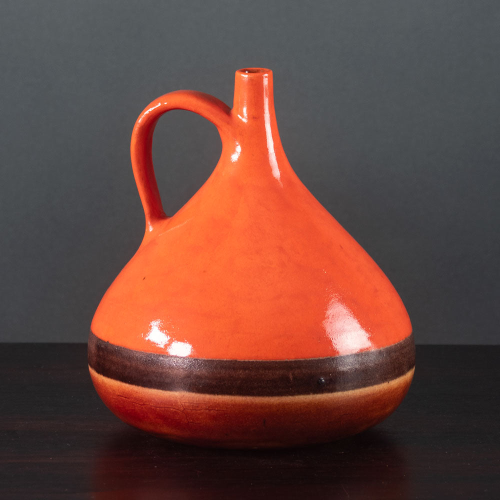 Bruno Gambone, Italy, stoneware handled vase with orange-red glaze K2029