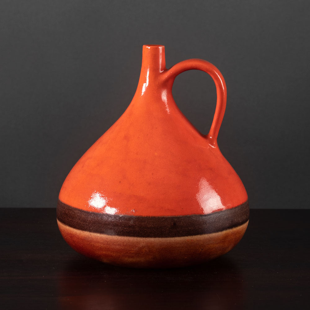 Bruno Gambone, Italy, stoneware handled vase with orange-red glaze K2029