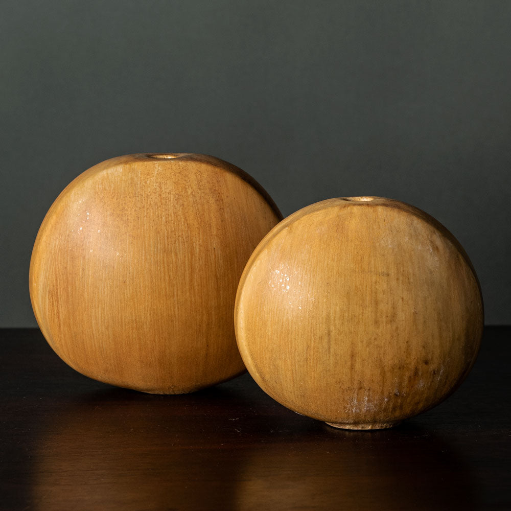Two flattened round vases with yellow glaze by Gotlind Weigel, Germany