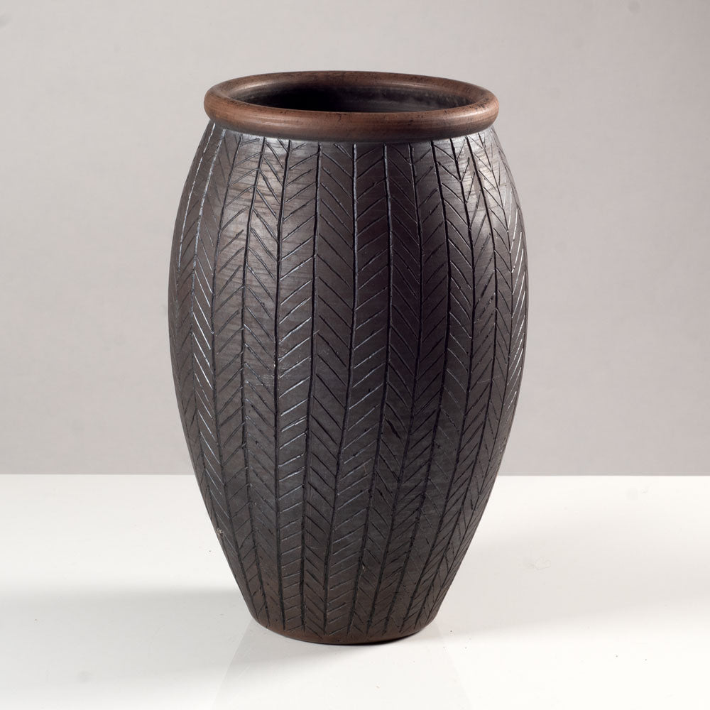 Tim Andrews, UK, earthenware raku vase with incised lines K3189