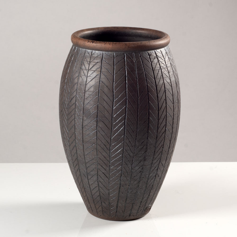 Tim Andrews, UK, earthenware raku vase with incised lines K3189