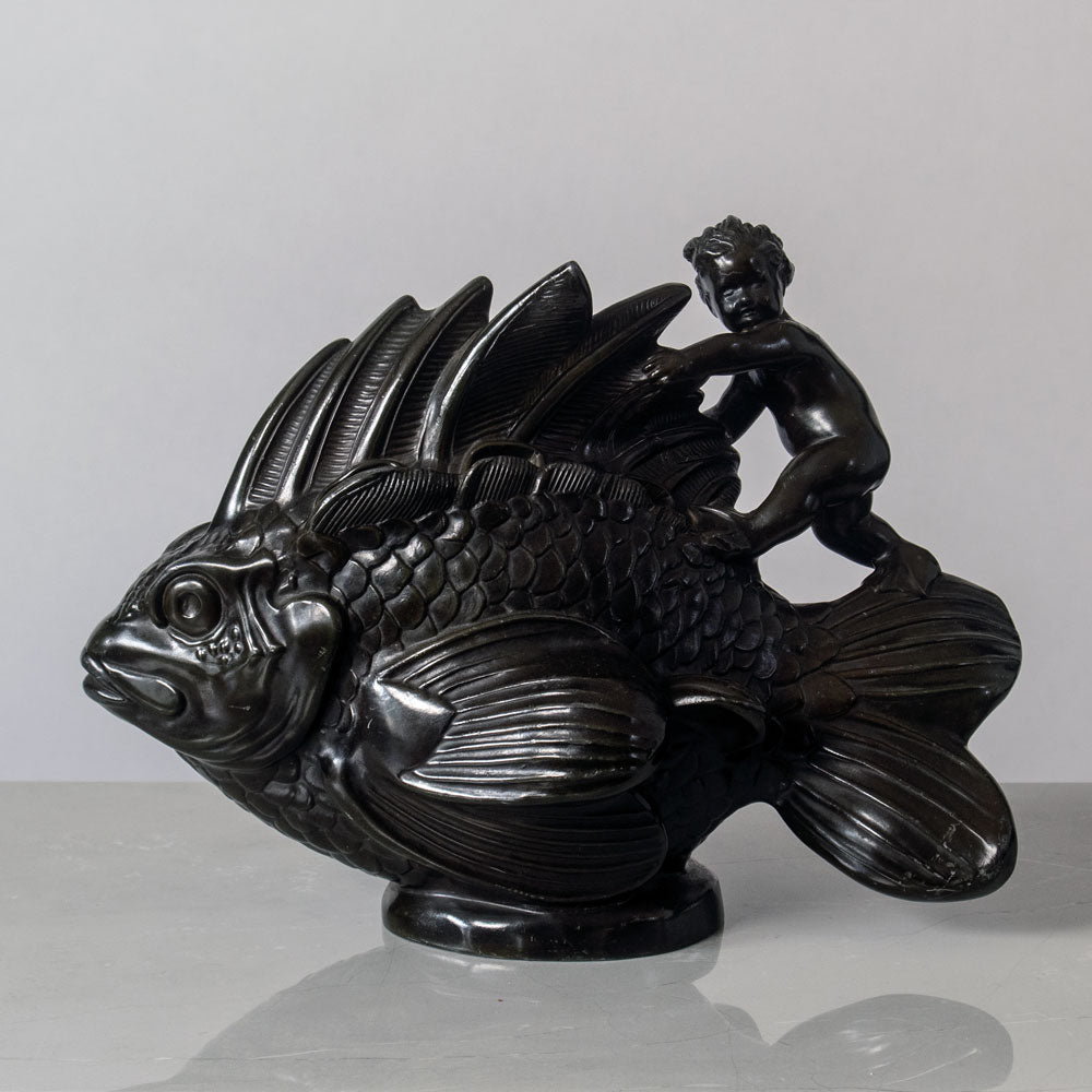 Just Andersen, Denmark, large "Disko" figure of of a mer-child riding a fish J1642