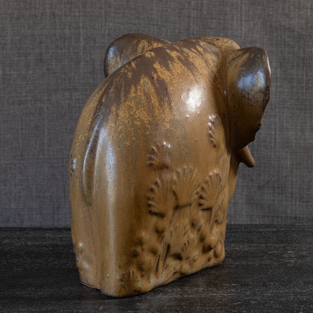 Arne Bang, Denmark, stoneware elephant with gold and brown glaze L3899