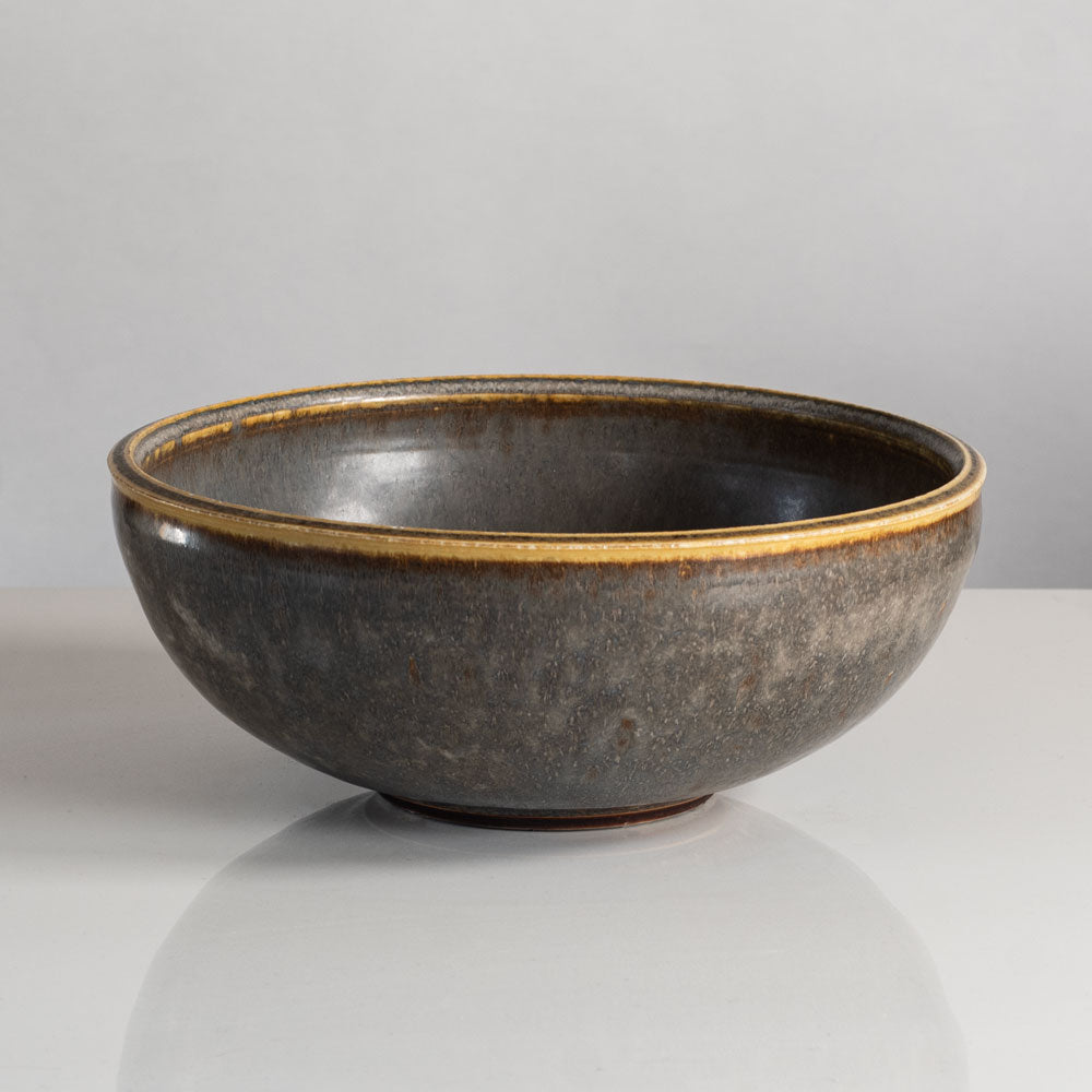 Carl Harry Stalhane for Rorstrand, Sweden, large stoneware bowl with yellow and gray haresfur glaze L3924