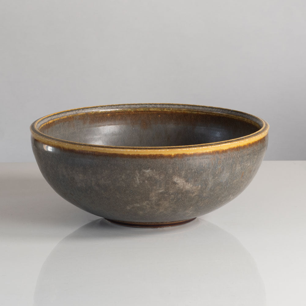 Carl Harry Stalhane for Rorstrand, Sweden, large stoneware bowl with yellow and gray haresfur glaze L3924