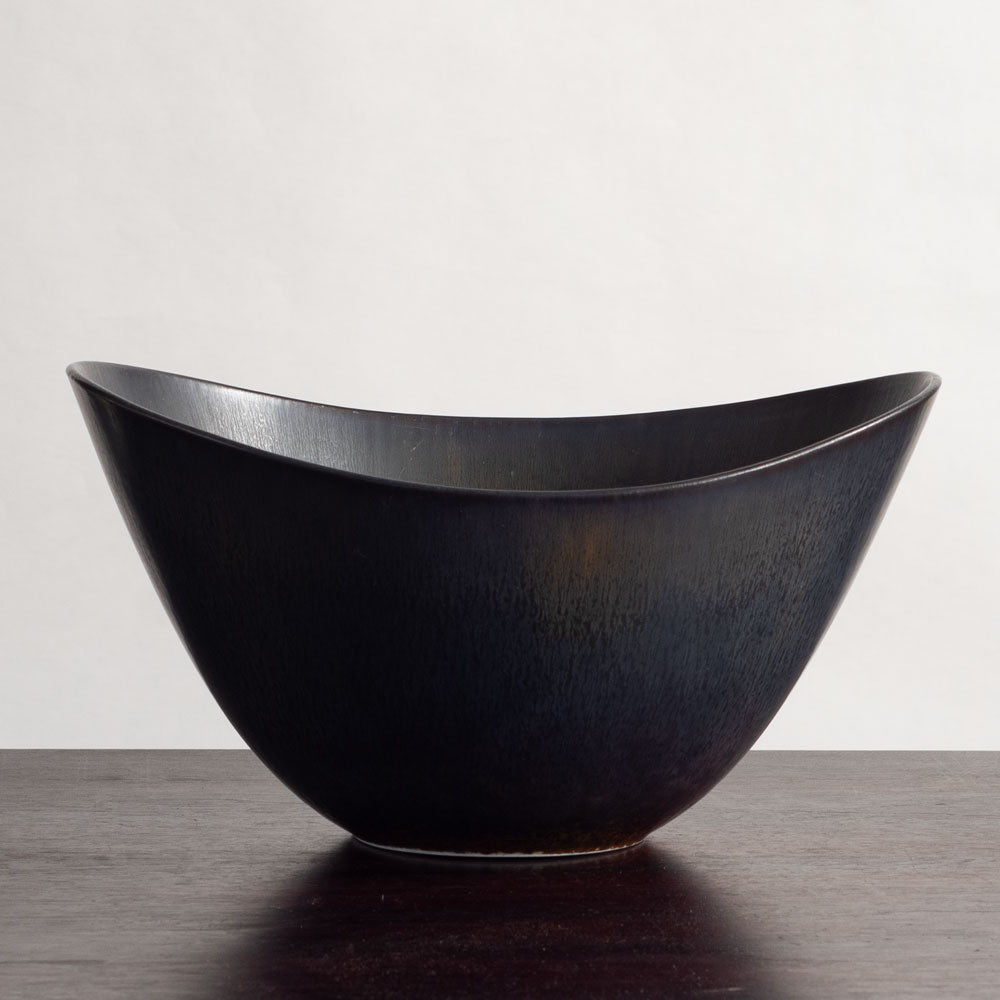 Gunnar Nylund for Rörstrand, Sweden, large ovoid bowl with black and brown glaze J1651