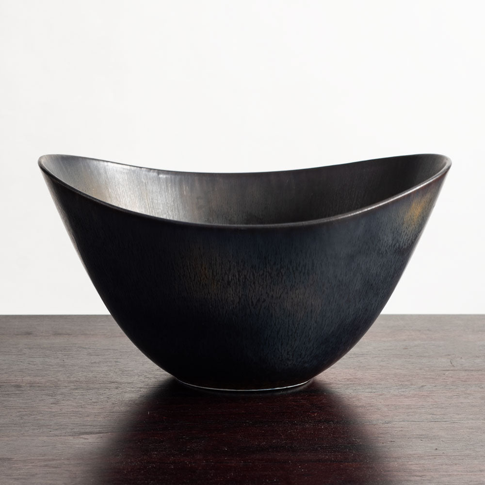 Gunnar Nylund for Rörstrand, Sweden, large ovoid bowl with black and brown glaze J1651