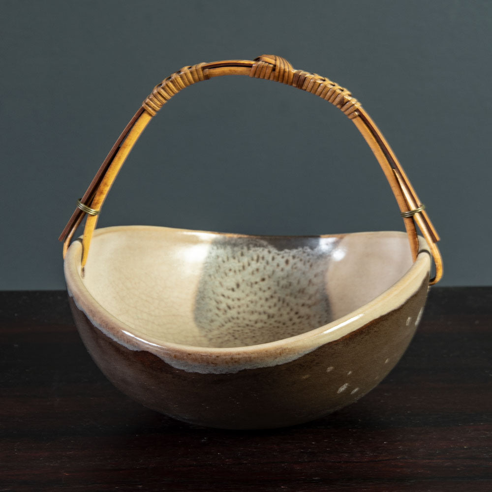 Richard Bampi, Germany, unique stoneware bowl with brown and pink matte glaze and wicker handle H1617