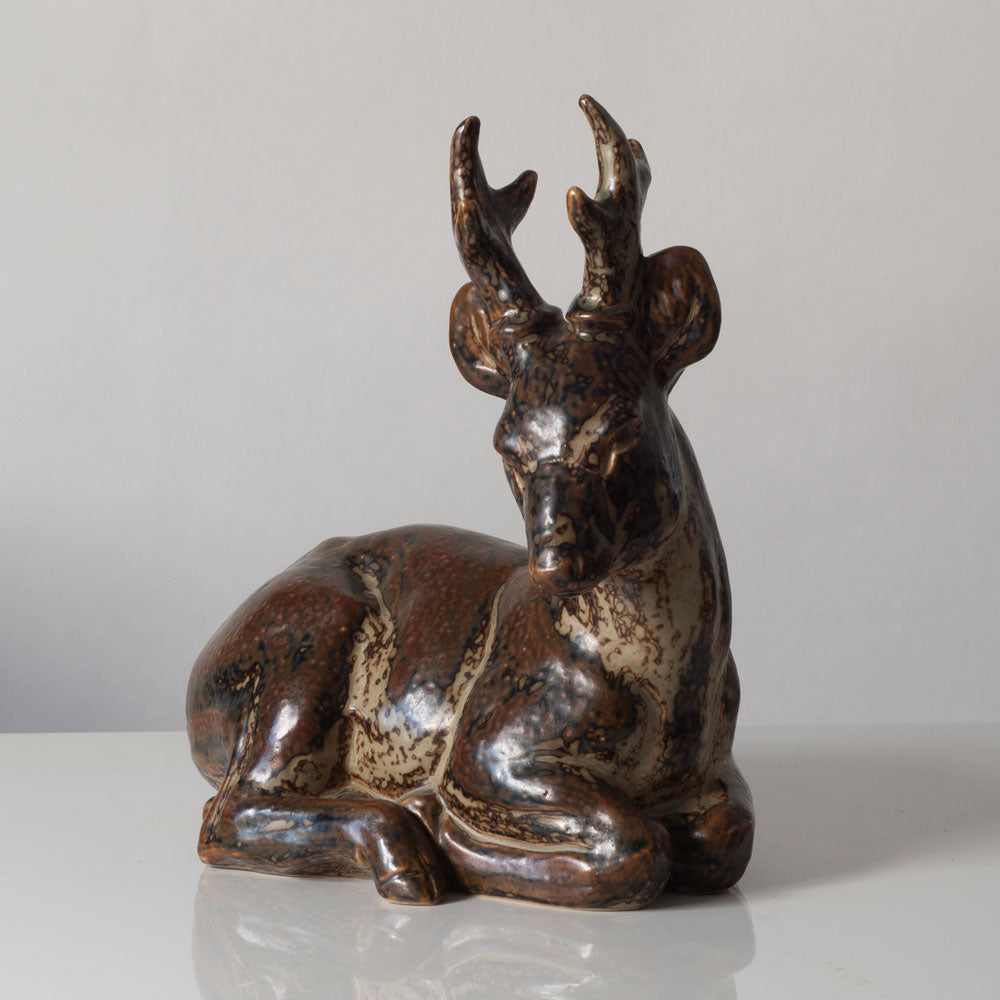 Knud Kyhn for Royal Copenhagen, Denmark, large stoneware figure of a stag with Sung glaze k2386