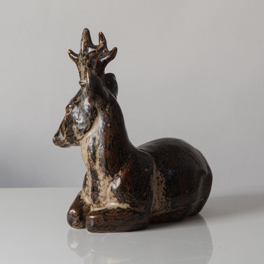 Knud Kyhn for Royal Copenhagen, Denmark, large stoneware figure of a stag with Sung glaze k2386