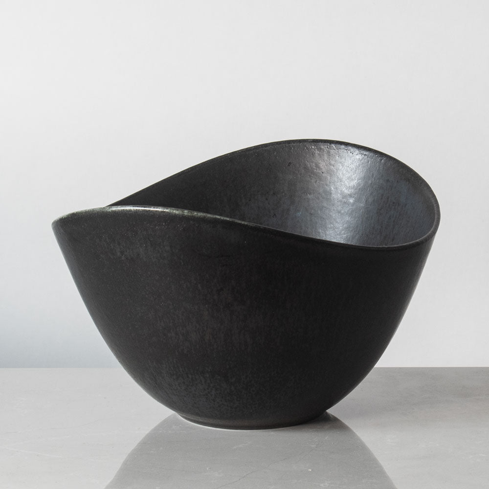 Gunnar Nylund for Rörstrand, Sweden, large ovoid bowl with black haresfur glaze J1012