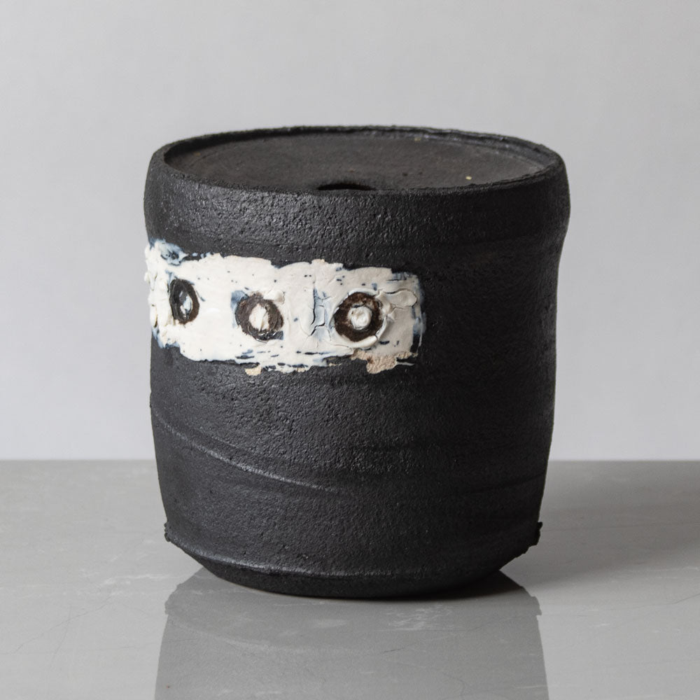Dan Kelly, UK, stoneware pot with matte black glaze and white band K2157