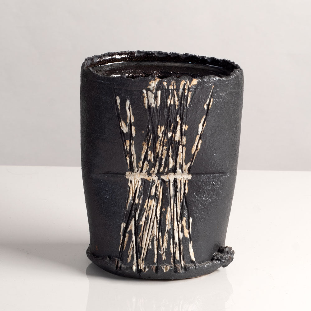 Group of vases with black glaze by Dan Kelly, UK