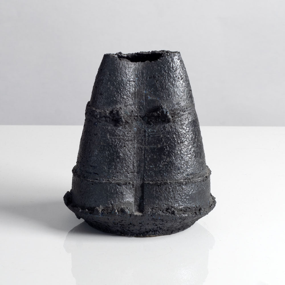 Group of vases with black glaze by Dan Kelly, UK