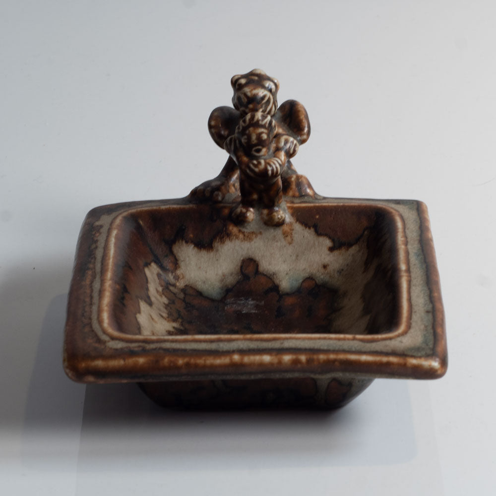 Bode Willumsen for Royal Copenhagen, Denmark, "The Tailor in Hell" square dish with sung glaze and sculptural form L3839