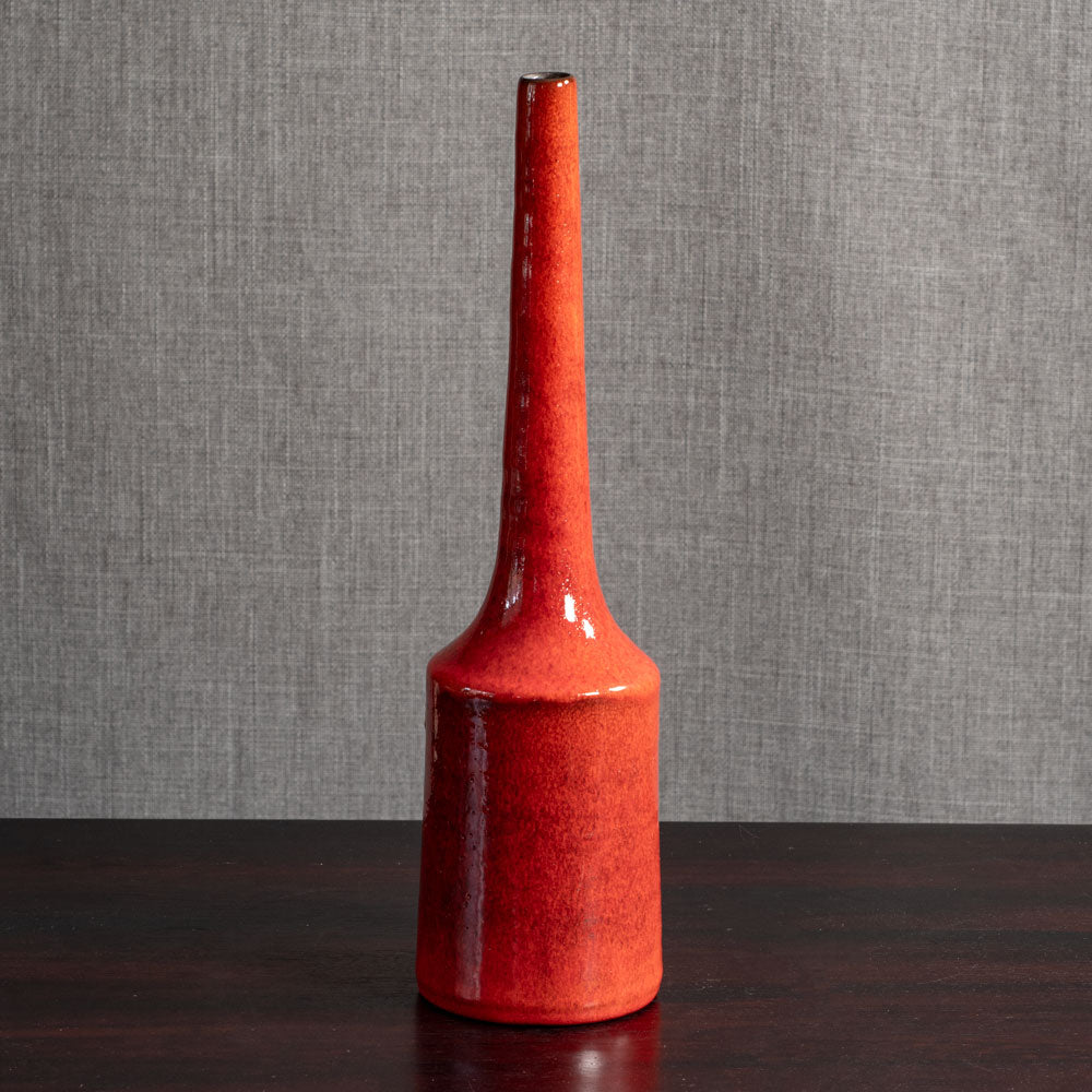 Jaap Ravelli, the Netherlands, long necked earthenware vase with red glaze M4128