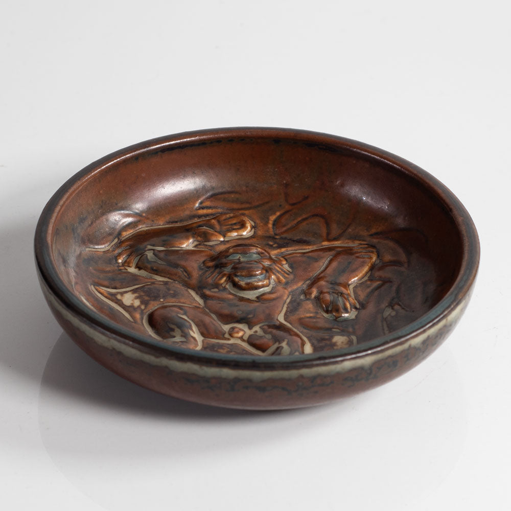 Knud Kyhn for Royal Copenhagen, Denmark, stoneware dish with ape in relief L3914