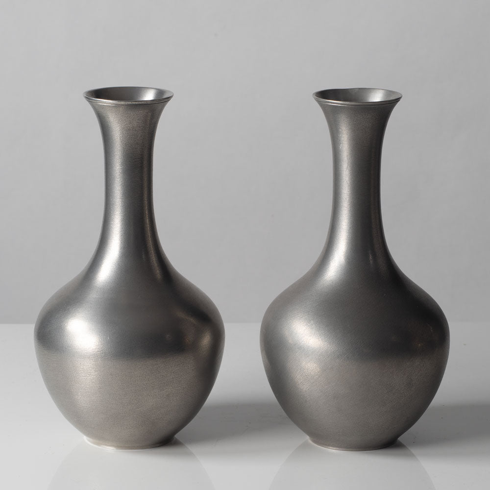 Schreuder & Olsson, Sweden, pair of pewter  vases L3053 and L3052