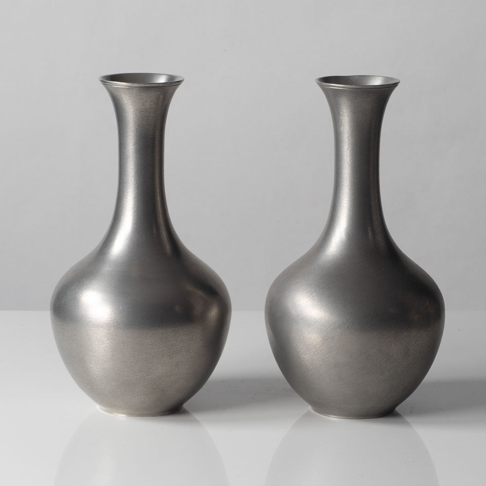 Schreuder & Olsson, Sweden, pair of pewter vases L3053 and L3052