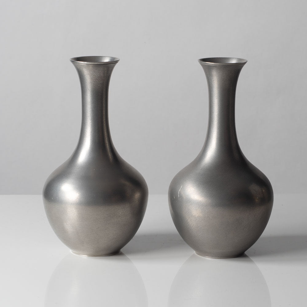 Schreuder & Olsson, Sweden, pair of pewter vases L3053 and L3052