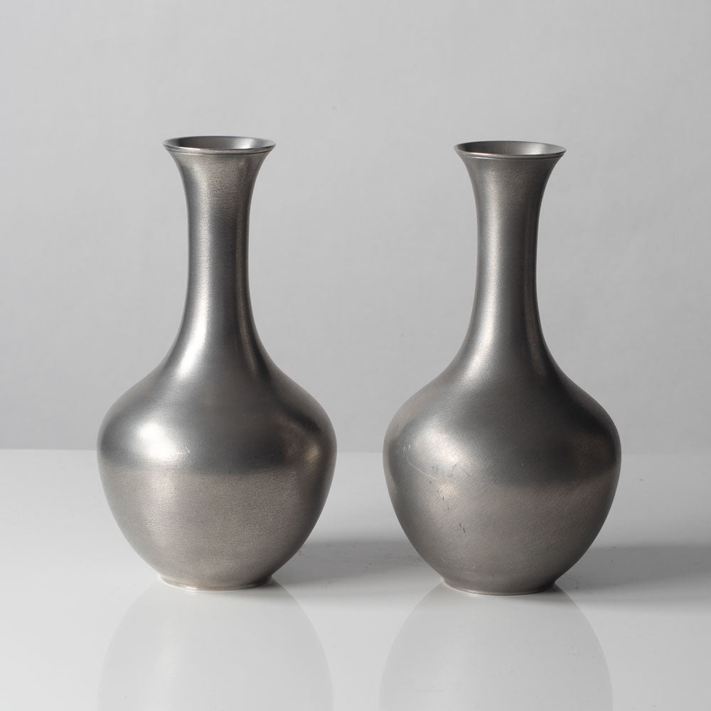Schreuder & Olsson, Sweden, pair of pewter vases L3053 and L3052