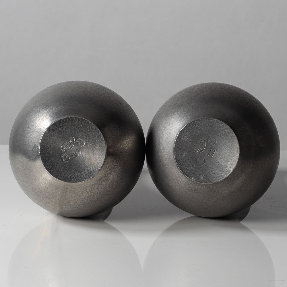 Schreuder & Olsson, Sweden, pair of pewter vases L3053 and L3052