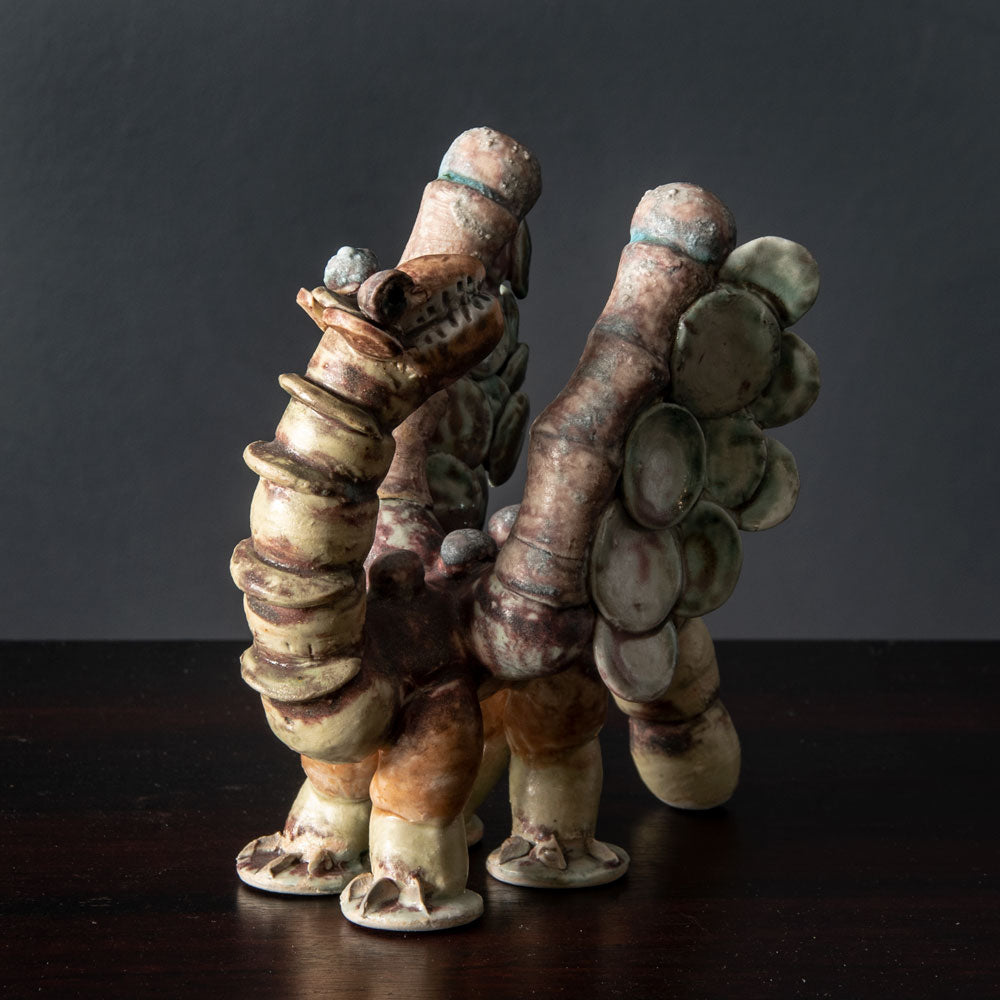 Beate Kuhn, Germany, unique monster figure with pink and cream glaze J1221