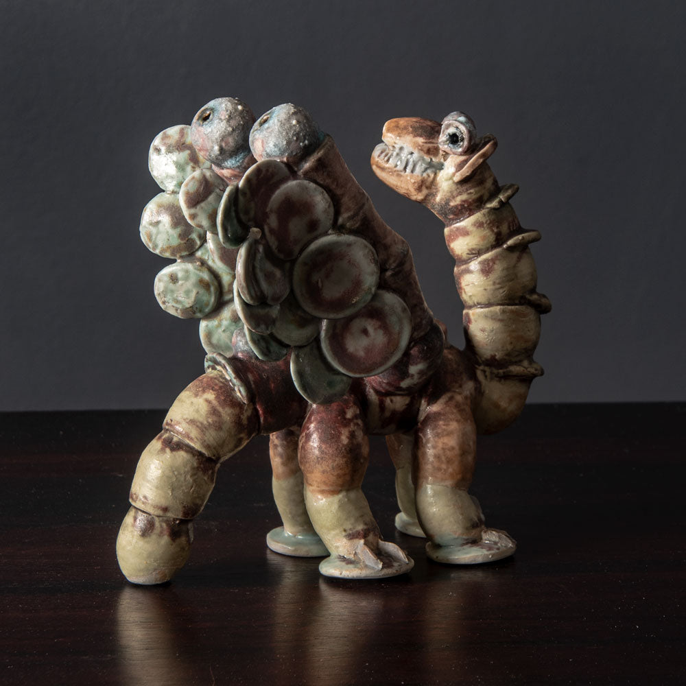 Beate Kuhn, Germany, unique monster figure with pink and cream glaze J1221