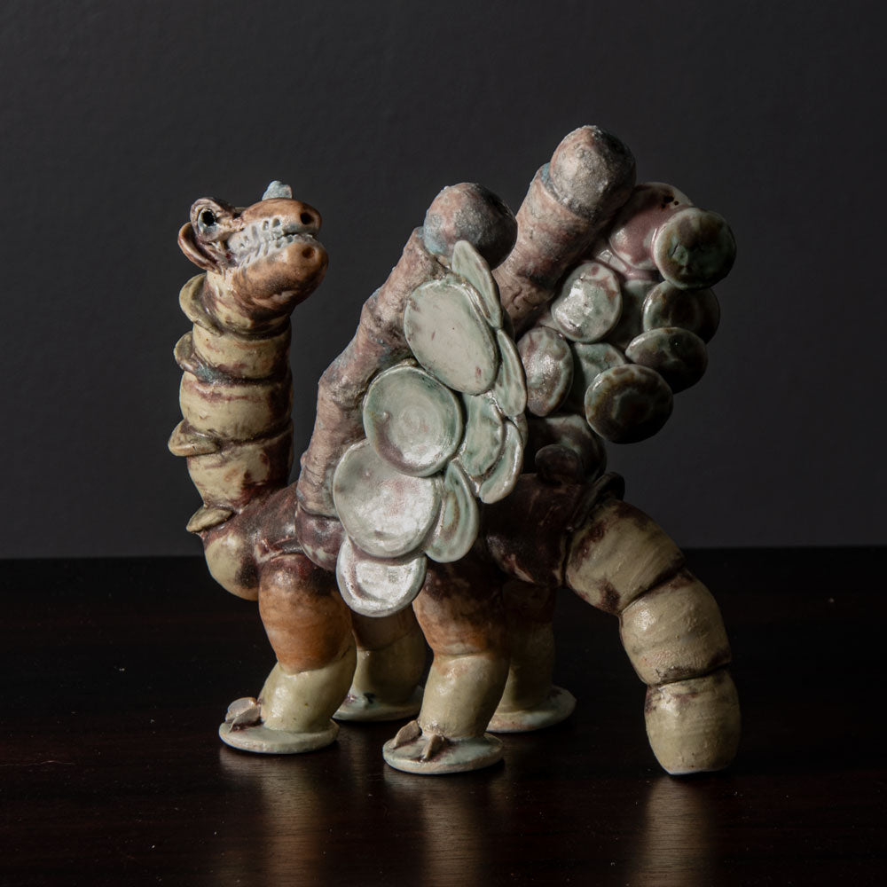 Beate Kuhn, Germany, unique monster figure with pink and cream glaze J1221