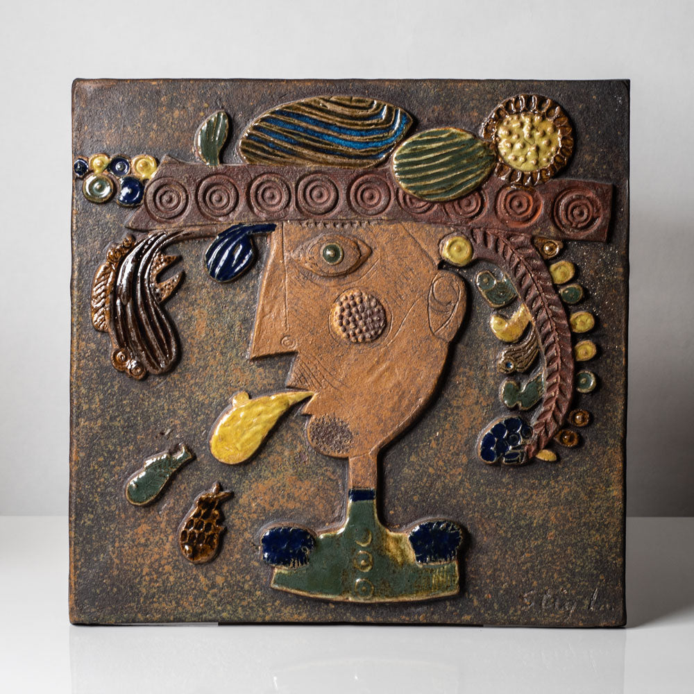 Stig Lindberg for Gustavsberg, Sweden, stoneware wall plaque with portrait in relief J1148