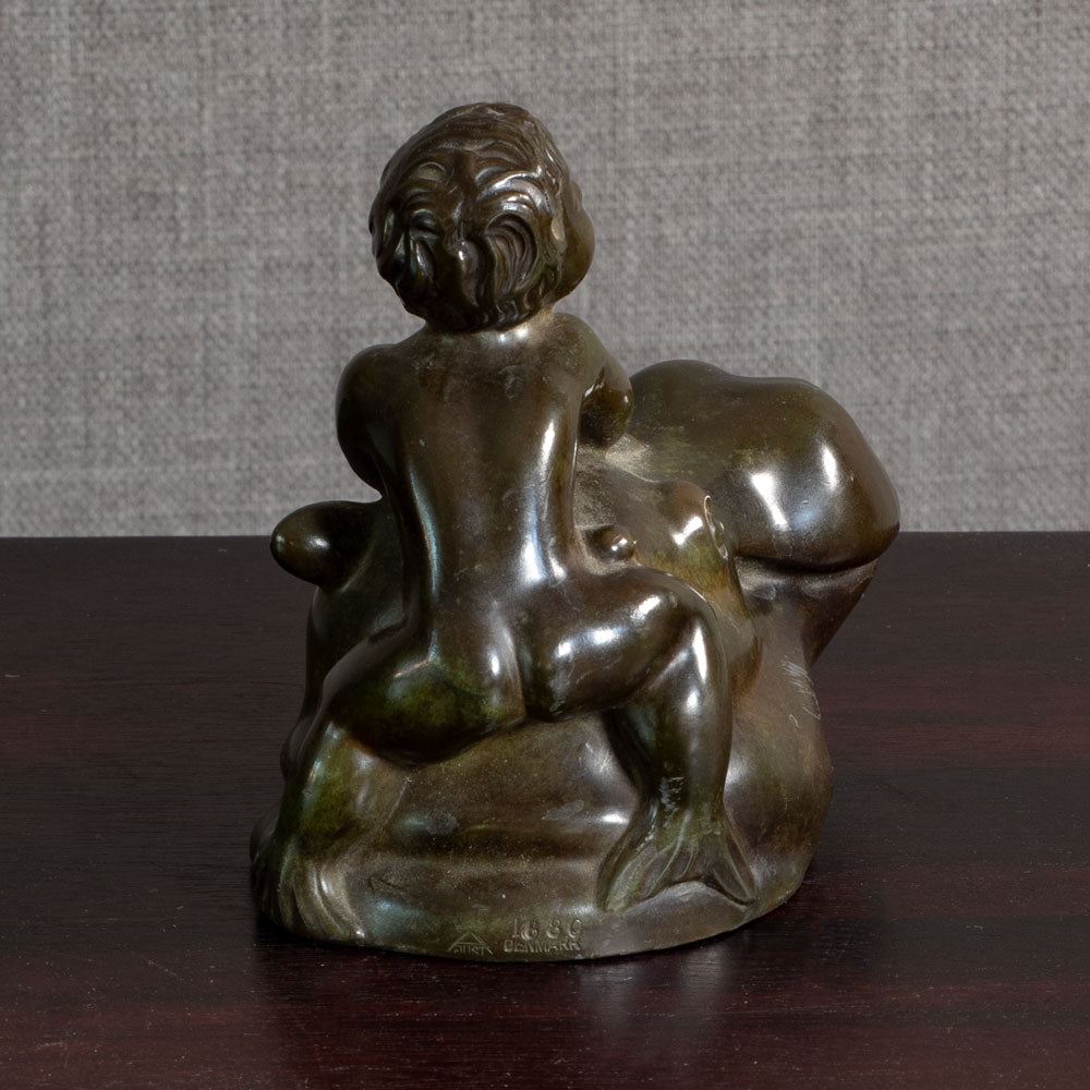 Just Andersen, Denmark, "Disko" figure of a mer-boy riding a hippo M4361