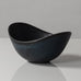Gunnar Nylund for Rörstrand, Sweden, small ovoid bowl with black and blue matte glaze J1652