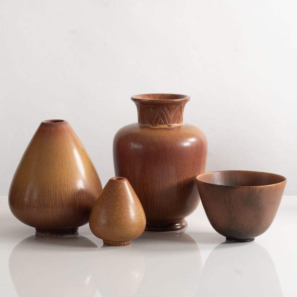 Four vessels with reddish brown glaze by Gunnar Nylund for Rörstrand, Sweden