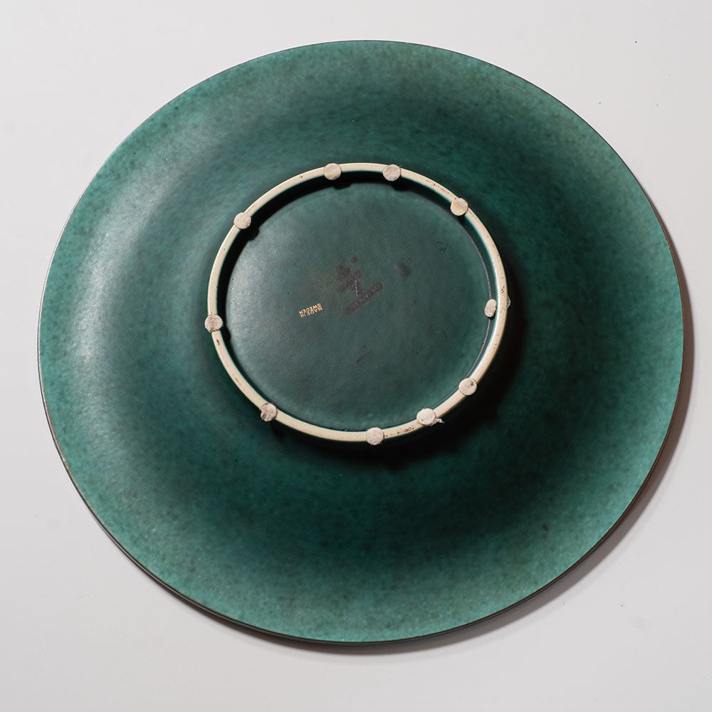 Wilhelm Kage for Gustavsberg, Sweden, "Argenta" charger with sea serpent J1203