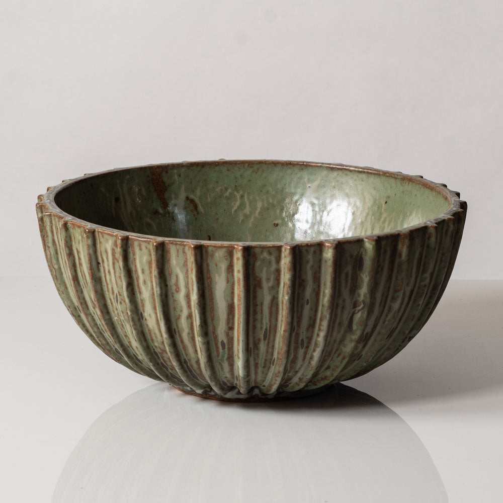 Arne Bang, Denmark, large ribbed stoneware bowl with green and brown crystalline glaze L3068
