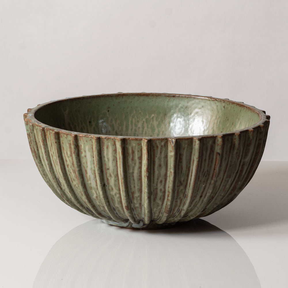 Arne Bang, Denmark, large ribbed stoneware bowl with green and brown crystalline glaze L3068