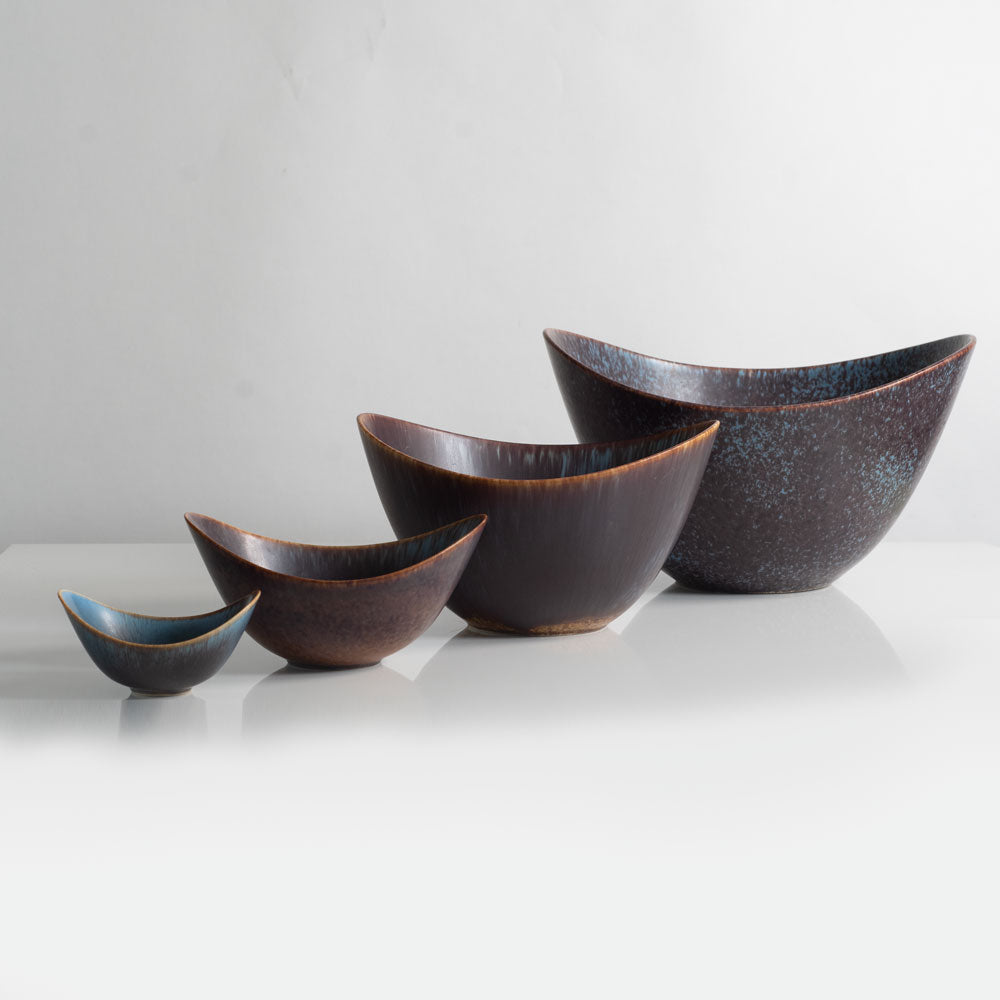 Group of ceramic elliptical bowls with blue and brown glaze by Gunner Nylund for Rorstrand, Sweden