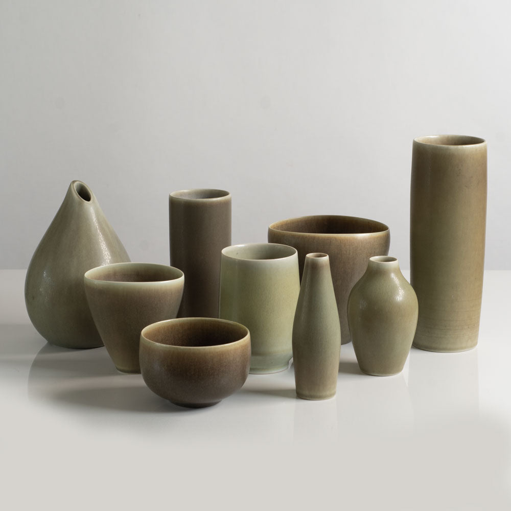 Group of vessels with olive haresfur glaze by Palshus, Denmark.