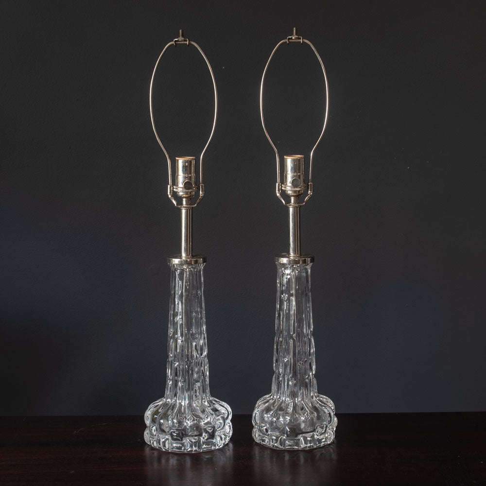 Carl Fagerlund for Orrefors, Sweden, pair of clear glass lamps J1561 and J1562