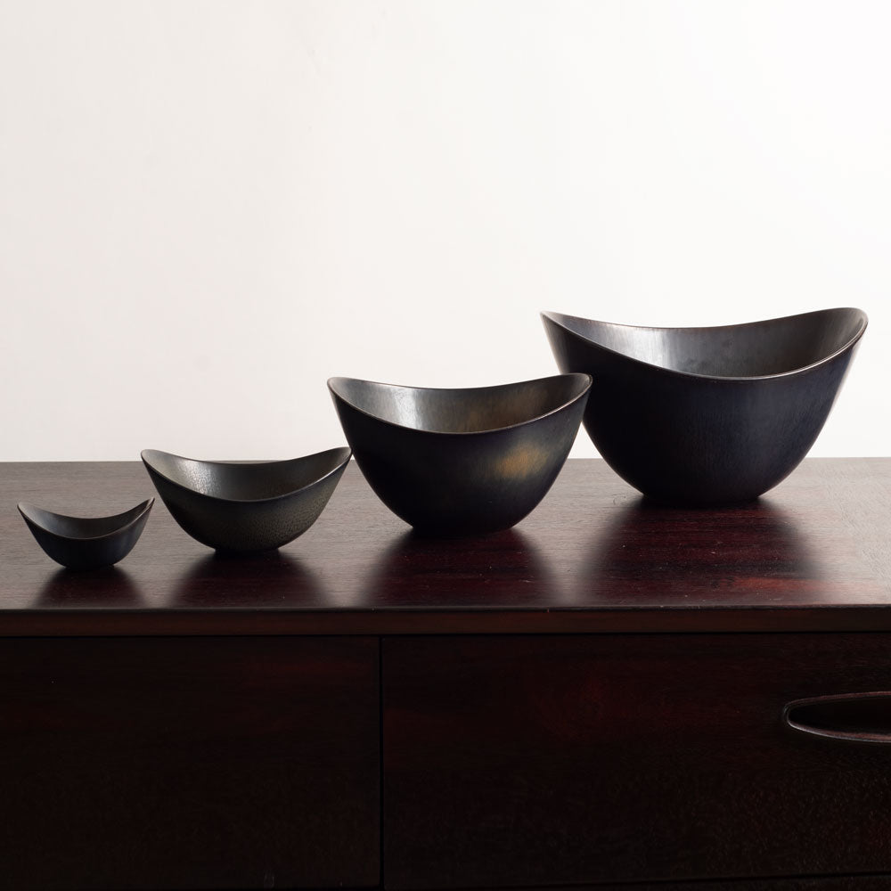 Group of ceramic elliptical bowls with black glaze by Gunner Nylund for Rorstrand, Sweden (Copy)