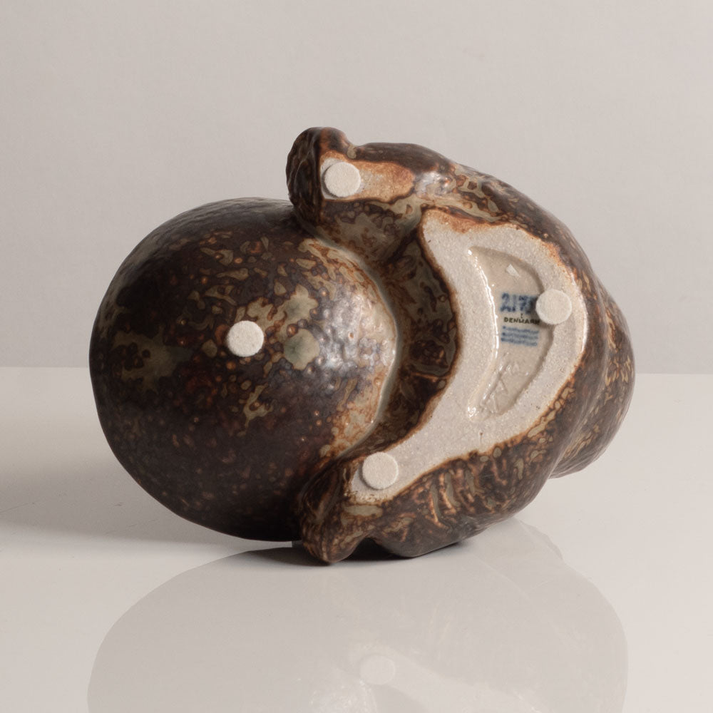 Knud Kyhn for Royal Copenhagen, Denmark, stoneware figure of a bear with a bowl M5757