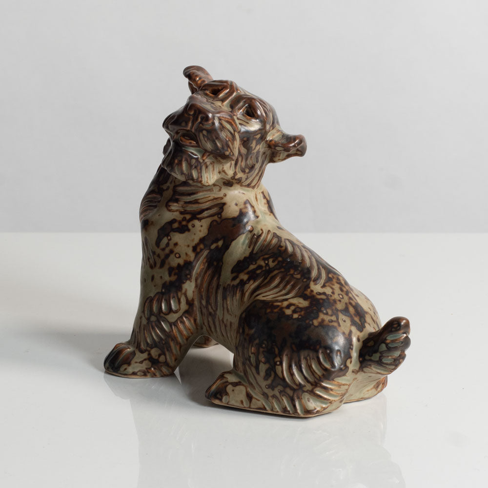 Knud Kyhn for Royal Copenhagen, Denmark, stoneware figure of a dog with Sung glaze M5722