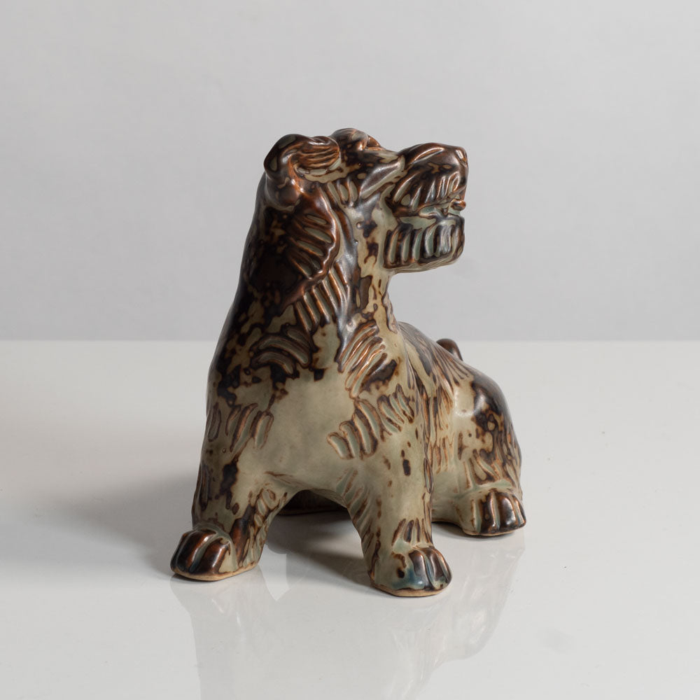 Knud Kyhn for Royal Copenhagen, Denmark, stoneware figure of a dog with Sung glaze M5722