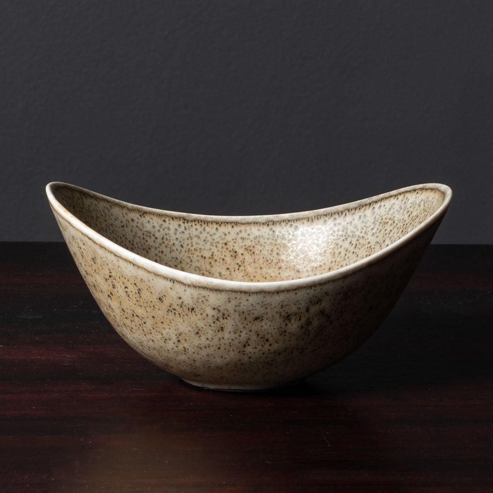 Gunnar Nylund for Rörstrand, Sweden, ceramic elliptical bowl with speckled light brown and gray glaze L3508